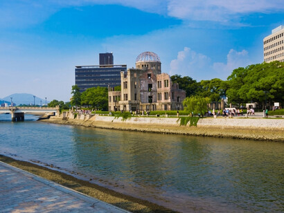 The Hiroshima Atomic Bomb Dome stands along the Aioi River in Hiroshima, Japan