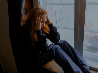 Woman struggling with her mental health