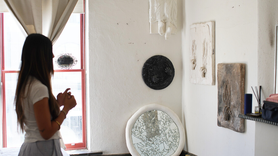 Step into the heart of Richmond, Melbourne, where Dannielle Carbone, the visionary behind DGianna Studio, welcomes you into her bone-white gallery space