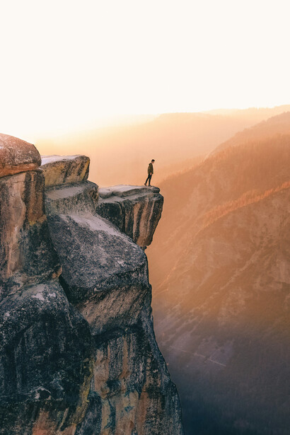 A man enjoys silence on a mountain