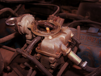 This intricate carburetor design showcases the engineering innovations that propelled internal combustion engines into the modern era