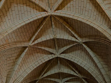 A symphony of architecture awaits within the hallowed halls of the Cathedral of Santa María la Menor in Ciudad Colonial, the historic central neighborhood of Santo Domingo, in the Dominican Republic, where Gothic grandeur meets Spanish colonial charm, each arch and pillar telling a story, echoing the footsteps of pilgrims and conquerors alike