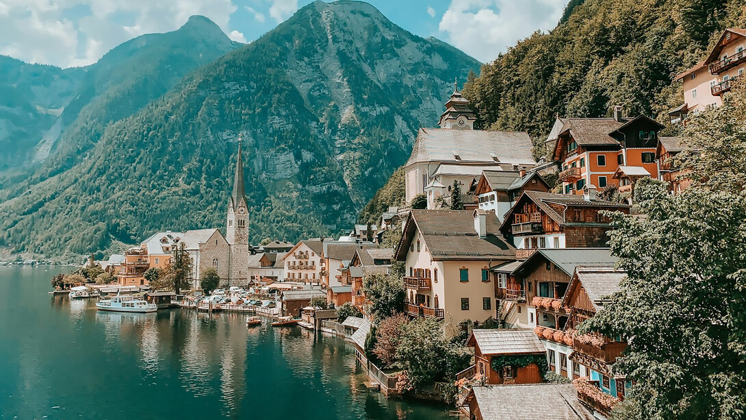 Hallstatt, Austria, is a UNESCO World Heritage village known for its breathtaking alpine scenery and rich cultural history