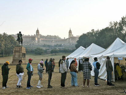 Eager to use their voice and cast a vote for their political party of choice, citizens of South Africa wait in line at a voting station at the Union Buildings in Pretoria, South Africa, on the 29th of May, 2024