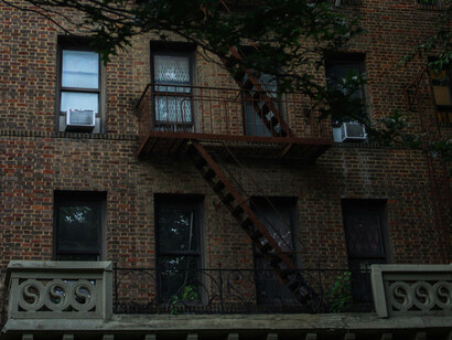 The typical front of a traditional Brooklyn apartment building
