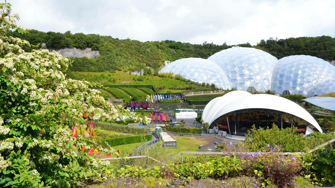 The Eden Project in Cornwall, UK where they took a worked-out quarry and transformed it using regenerative sustainability practices into numerous thriving gardens and habitats.