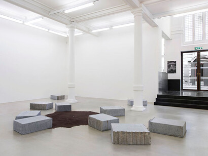 Installation view. Il panorama verso oltremare intorno dove le stelle si avvicinano di una
spanna in più, 2001, Diorite granite stones, Oltremare paint, 10 x 23 x 31 in. (25.4 x 58.4 x 78.7)