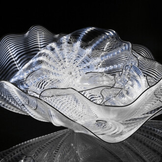 Dale Chihuly, Radiant white persian set with ebony lip wraps, 2015. Courtesy of Leila Heller Gallery