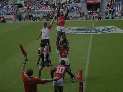 Captivating snapshot from the Canada vs. Kenya match at the Emirates Airline Edinburgh Sevens, showcasing the intensity and athleticism of international rugby competitio