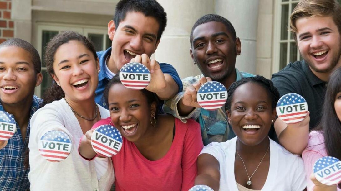A crowd of young voters showing that they performed their democratic duty