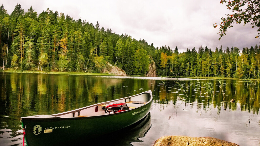A boat anchored along tranquil waters