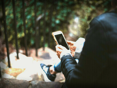 A teenager on her phone, getting used to instant gratification