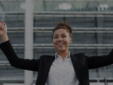 Empowered businesswoman embracing self-discovery and personal growth through breaking the cycle of mistakes and learning from past experiences