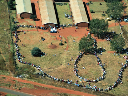 Aerial view of a long queue of voters during South Africa's historic first general elections on the 27th of April, 1994