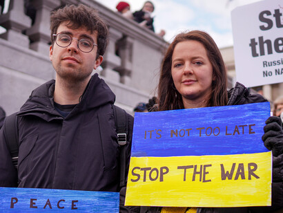 As demonstrators voice their opposition to the war in Ukraine, they echo the sentiment that, despite the New START treaty's efforts, military escalation remains a pressing threat to global unity and security