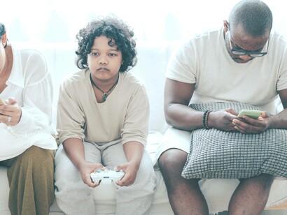 All family members busy using technology