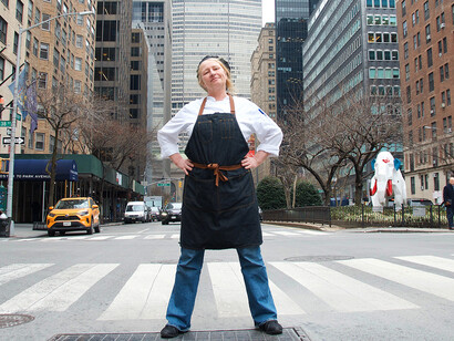 Ulrika Bengtsson standing amidst the big city skyscrapers. Photo by Maria Mellin