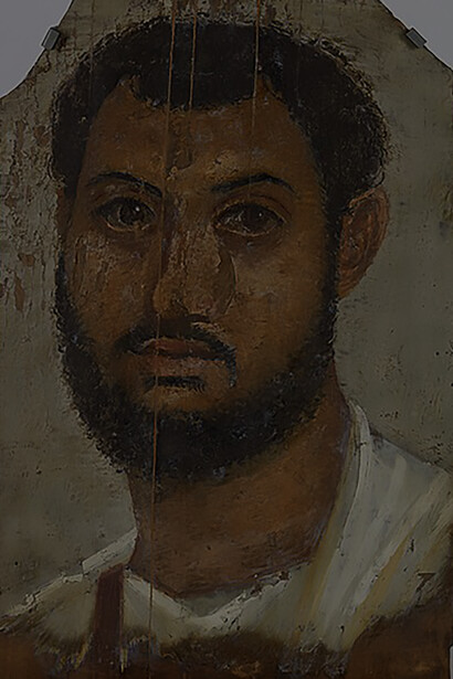 The captivating mummy trappings including a striking painted portrait of a bearded man, originating from Egypt and possibly discovered in Negatine-Ella or Hawara. Crafted from wood and adorned with intricate paintwork, this artifact offers a glimpse into ancient Egyptian artistry