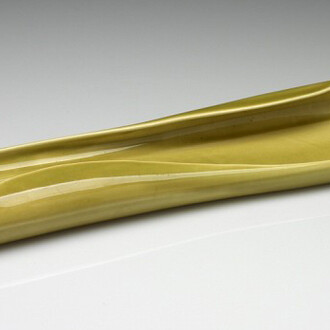 Russel Wright, designer, American, 1904-1976, Steubenville Pottery, manufacturer, American, 1879-1959, American Modern Celery Dish, 1937, Glazed earthenware, 3.2 x 33.3 x 8.9 cm (1 1/4 x 13 1/8 x 3 1/2 inches)
Gift of Judith Tannenbaum in honor of Gertrude D.T. Schimmel 2006.136.1