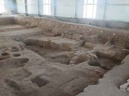 The restored ruins of ancient structures at the Aksikent monument in Uzbekistan