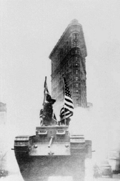 One of the first American tanks driving past the 'Flatiron' building in New York. (Photo by Three Lions/Getty Images)