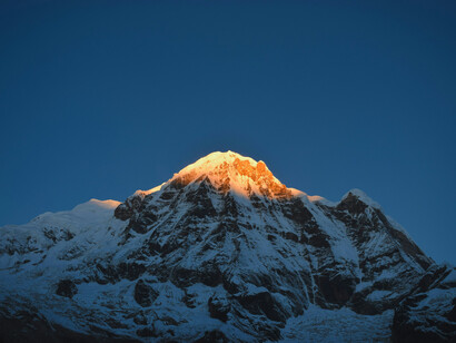 The Himalayas bathed in the light of the setting sun; spanning five countries, they include some of the world’s highest peaks including Mount Everest, the tallest mountain above sea level