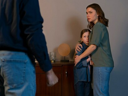 A young child suffering from parental abuse at home, experiencing domestic violence, fear, and emotional trauma