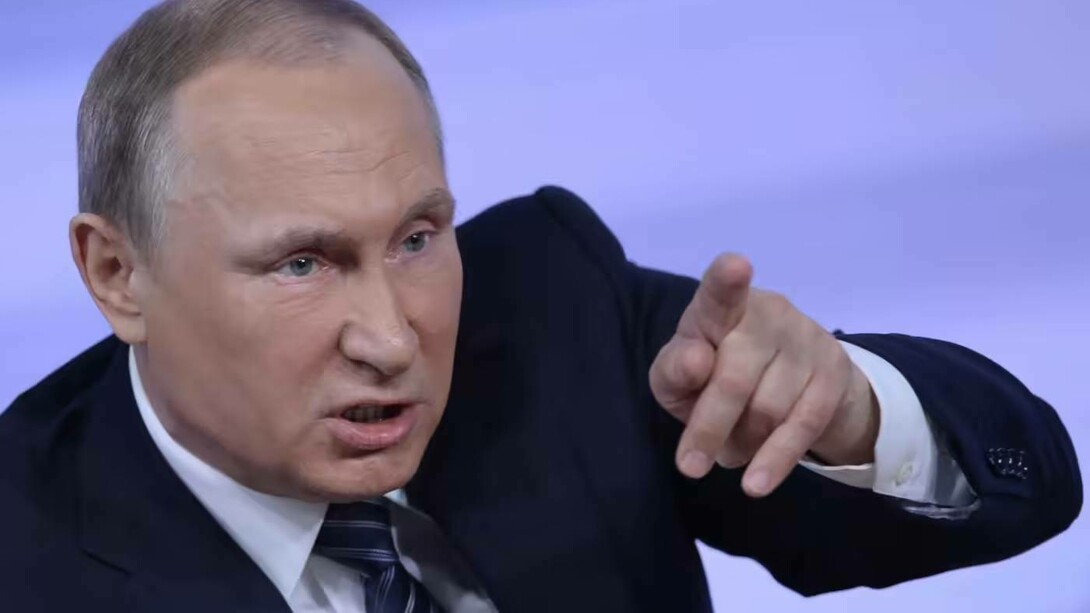 An angry Vladimir Putin communicating his thoughts on Russian national television