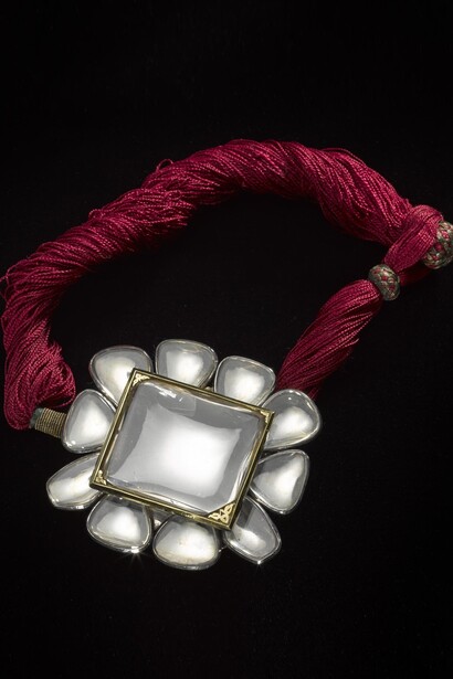 Armlet composed of a central rock crystal and ten smaller stones set in silver, Northern India, 1800-1850 © National Museums Scotland