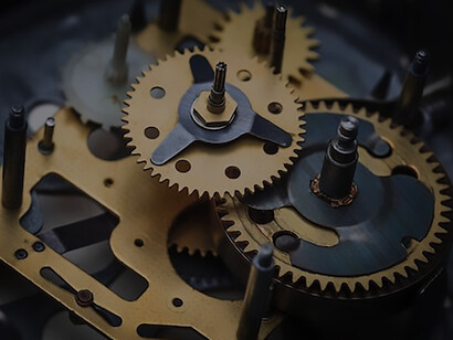 A finely detailed glimpse into the macroscopic realm of a clock's inner workings, where the delicate interplay of gears and mechanisms unfolds, crafting the symphony that orchestrates the measurement of time