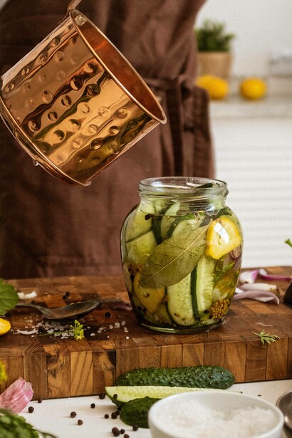 Pouring liquid into pickling jar