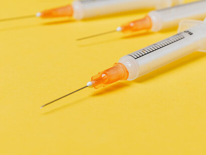 Amid the grim image of a used syringe, the absence of prominent Australian voices addressing the meth crisis in the country becomes glaringly apparent, revealing a disconnect between fame and social responsibility