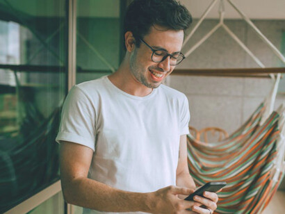 With a smile as he scrolls, he's found a balanced approach to social media, focusing on inspiring and supportive interactions