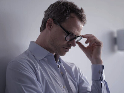 A man ponders carefully, torn between the longing for the simplicity of childhood and the allure of embracing the freedom and responsibilities of grown-up life