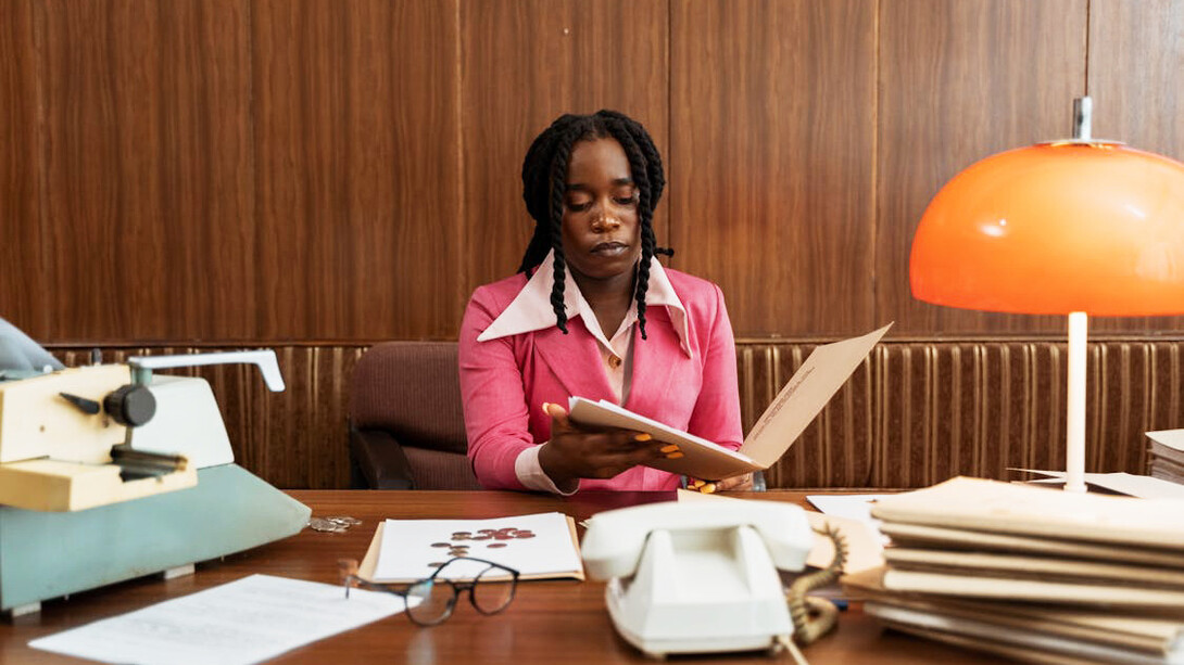 The old telephone and copier offer a glimpse into the tedious days of sorting through stacks of paperwork before the rise of automated procurement platforms
