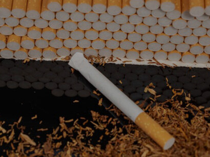 A pile of cigarettes resting on a surface