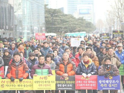 A calm but organised protest by Asian stakeholders disputing the practices of their homeland company