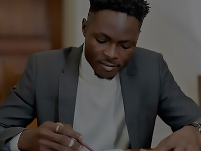 A businessman diligently operates from his desk