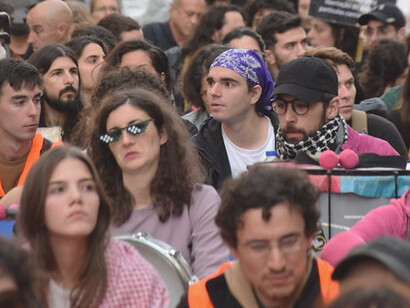 Silent sit-ins are part of a worldwide movement calling for a new path to global economic justice, challenging the status quo that perpetuates poverty and exploitation