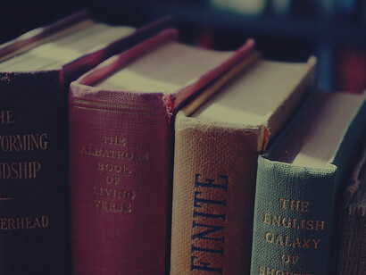 Rows of old books standing together