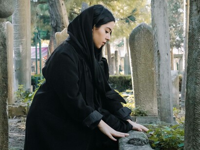 Woman mourning a deceased relative