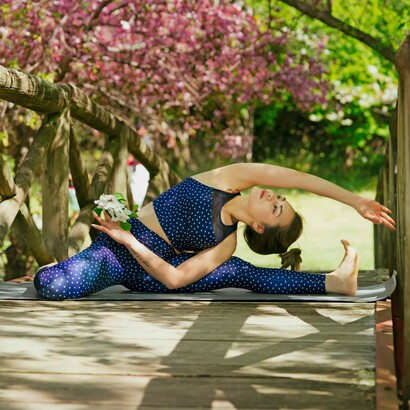 A woman connecting with nature and her inner self through yoga