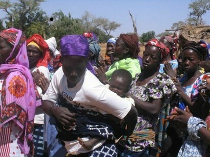 A Sakouli woman with her baby