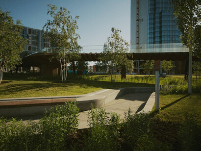 A lush green urban park demonstrates the benefits of integrating nature into city spaces, offering both beauty and ecological balance