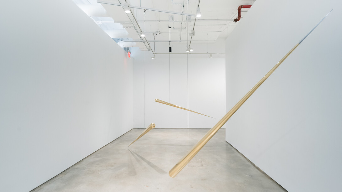 Artur Lescher, 5120 Tango, 2022, brass and steel cable, 12x240 cm, edition of 5. Courtesy of the artist and Piero Atchugarry Gallery, Miami