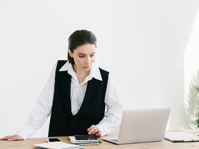 With just a few clicks, this businesswoman is accessing global markets and making informed decisions—a far cry from the manual, time-consuming processes of the past