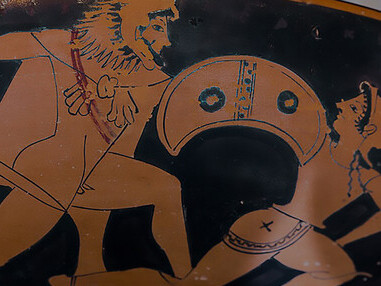Late Archaic period with the Oltos pottery clay artwork, featuring a young warrior equipping his greaves, helmet, and shield while bearing the inscription 'Memnon Kalos, the legendary confrontation of Heracles against three Amazons, skillfully depicted by the renowned Athenian painter Oltos around 520 BC, showcasing a unique blend of hoplite and Scythian archer motifs