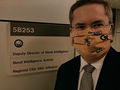 The Deputy Director of Naval Intelligence Scott W. Bray in front of his office who's tasked with tracking UFOs