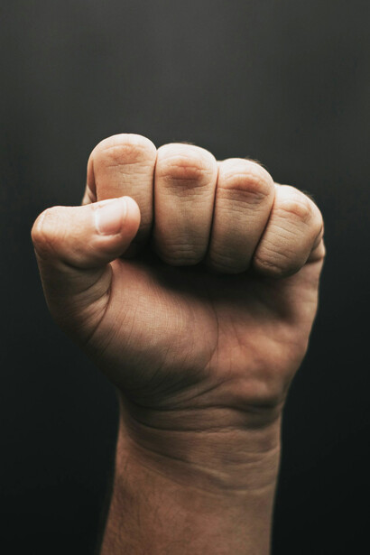 A closed fist depicts the significance of saying nowhere necessary