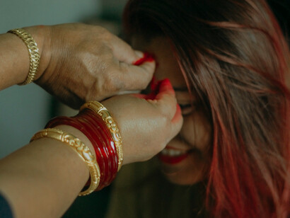 Dashain, the longest Hindu festival in Nepal, is traditionally celebrated for two weeks with prayers and offerings to Durga, the Universal Mother Goddess. This major harvest festival brings families together for reunions, gift exchanges, and elaborate pujas, making it a time of joyous celebration and spiritual significance